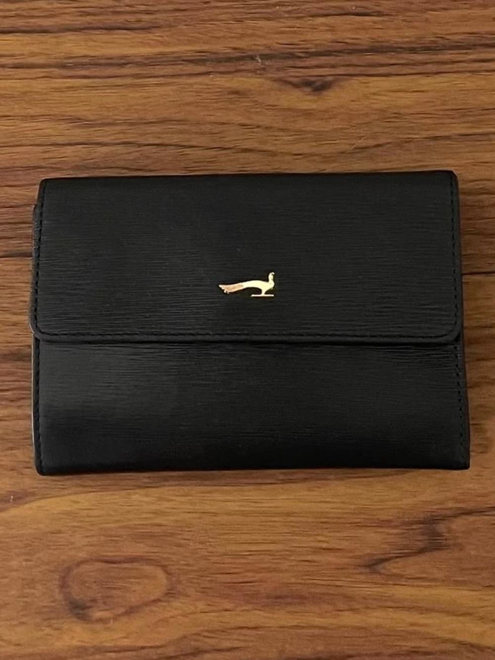 Sleek Black Women's Trifold Wallet with Gold Accent